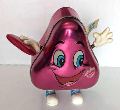 Hershey's kisses hot pink metal tin; Figure with arms, legs, face