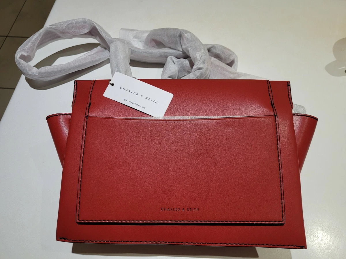 Charles and deals keith red bag