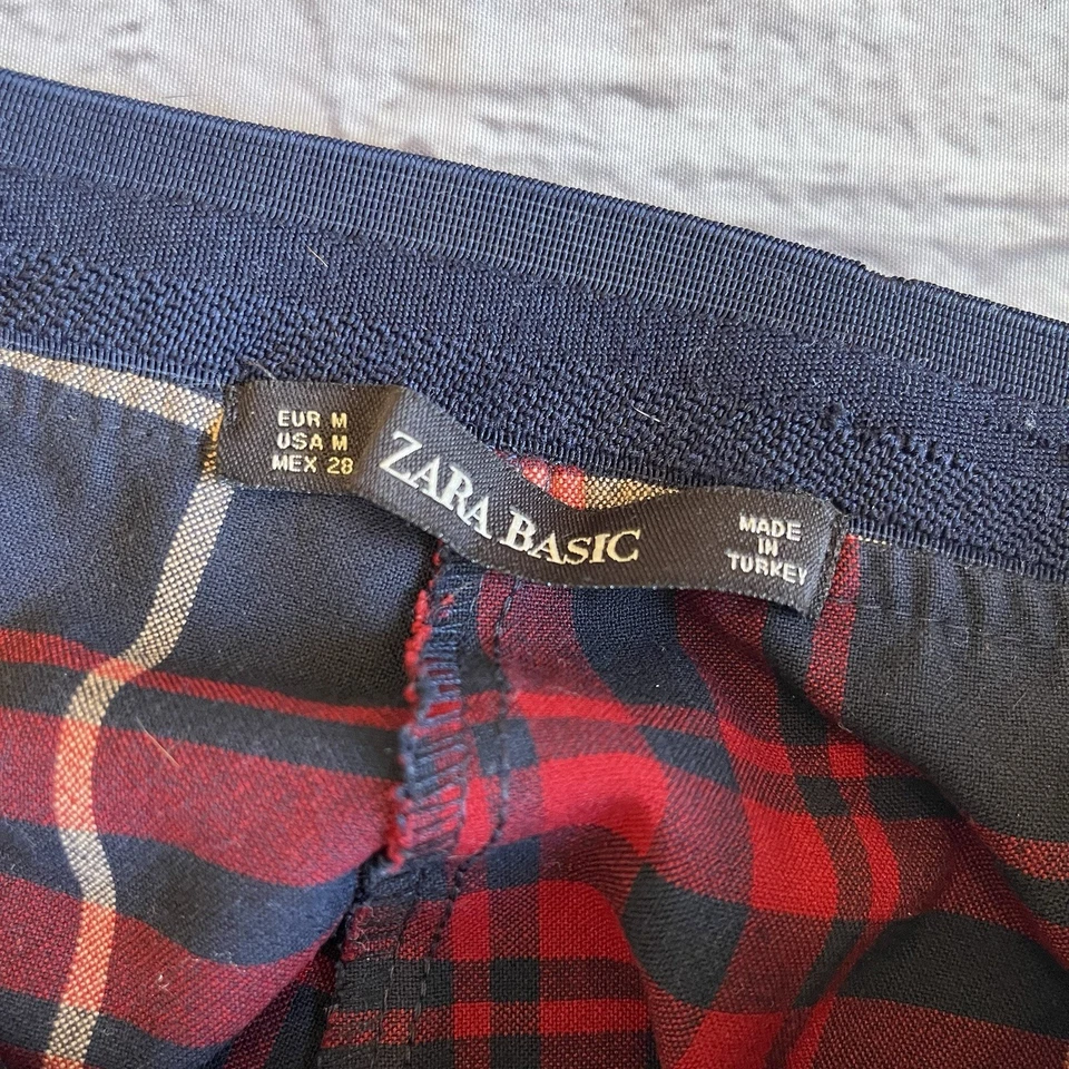Pantalones ajustados a cuadros escoceses rojos de Zara talla mediana fiesta navideña para mujer Foto 2 de 4