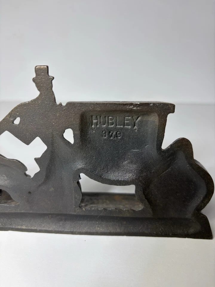 Tope de puerta Hubley acabado latón hierro fundido sujetalibros caballo y carruaje antiguo Foto 2 de 4