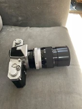 NIKKORMAT FTN (CIRCA 67-75) + 135 mm f2.8 Q NON AI LENS--WORKING , METER?