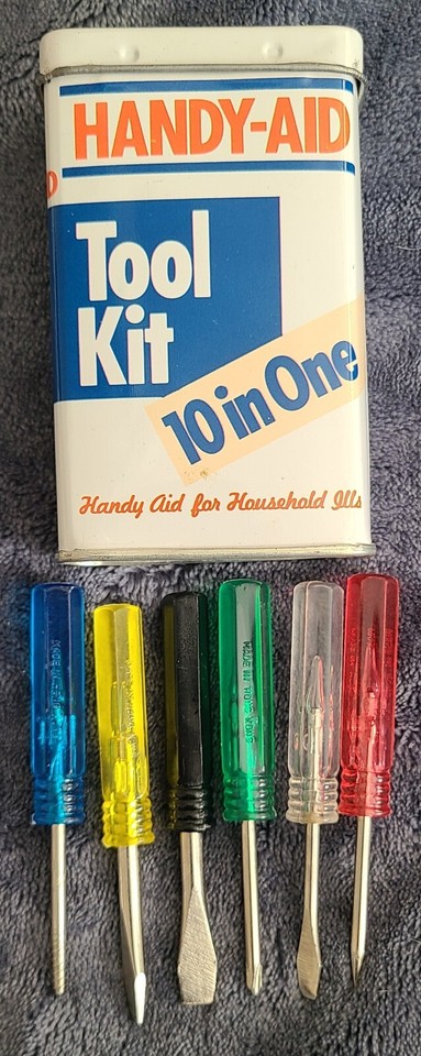 A vintage 10-in-1 screwdriver kit in its original graphic tin — the kind of mid-century packaging that belongs on a shelf as much as in a toolbox.