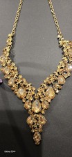 Gold colored metal and Floral Necklace Earrings Set