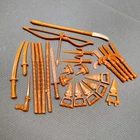 Lot of 25 Vintage Teenage Mutant Ninja Turtles Brown Weapon Accessories TMNT
