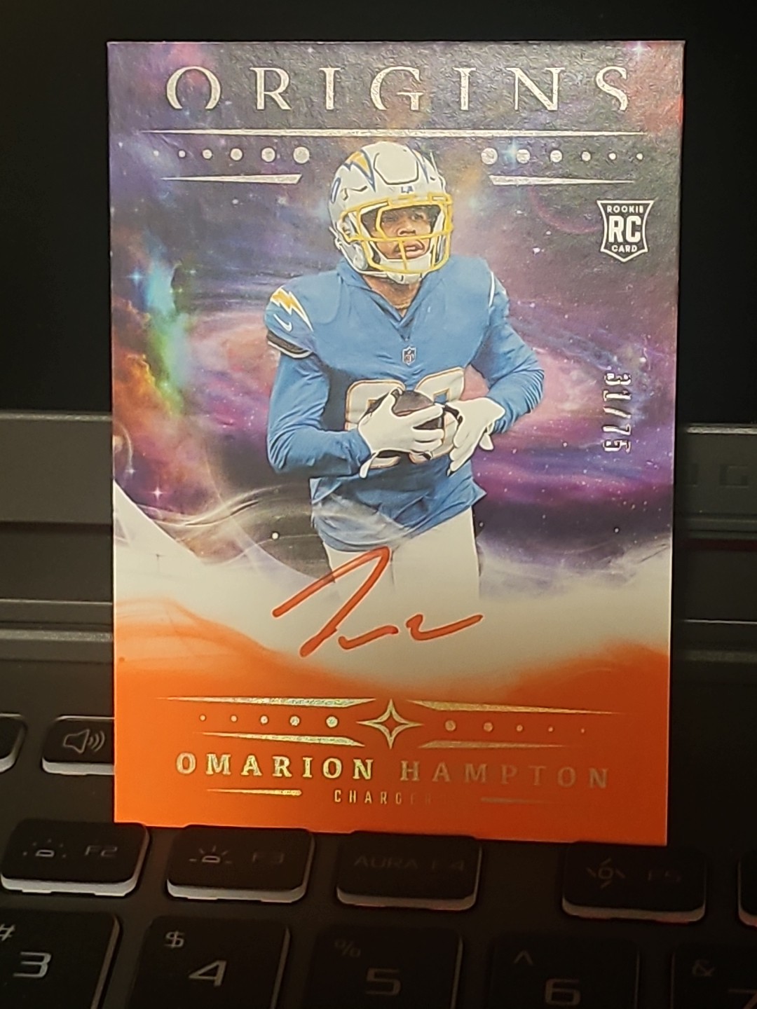 2025 Panini Origins - Rookie Autographs Omarion Hampton #RA-OHA Orange /75  RC