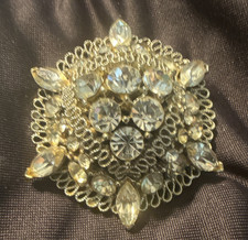 Vtg Lisner domed filigree rhinestone brooch s...