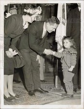 1947 Press Photo Governor Robert Bradford greets Meredith Caron as wife looks on