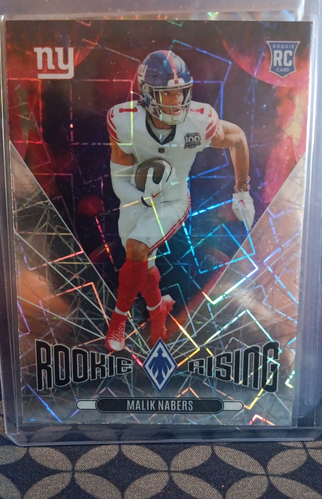 2024 Panini Phoenix - Rookie Rising Malik Nabers #RR-MNS Lazer (RC)