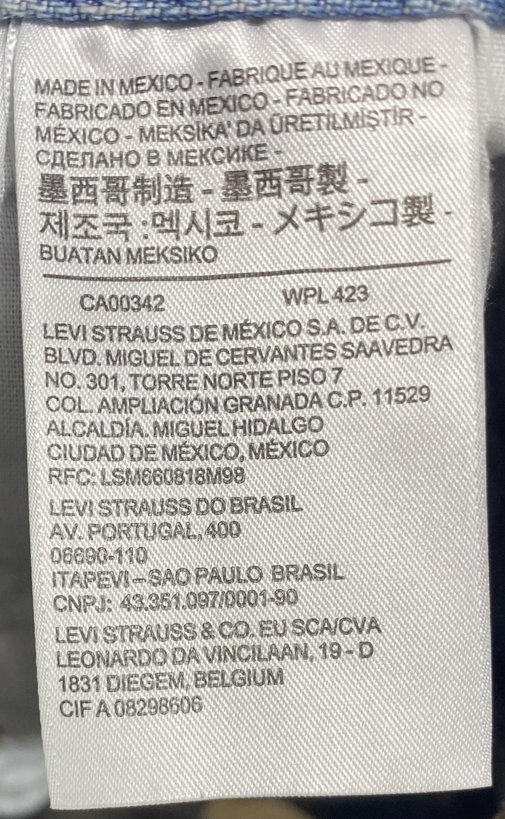 Levi's 501 Premium Denim Shorts Womens 33 Fits 34 Blue Distressed Cutoff Raw Hem thumbnail 9