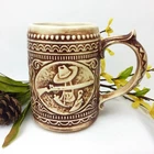 Vintage McCoy Americana Embossed Ceramic Stein Mug Deer Gun Motifs