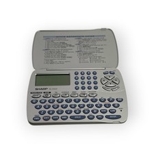 SHARP EL- 6920B - ENGLISH / SPANISH TRANSLATOR - 96KB PERSONAL ORGANIZER W GAMES