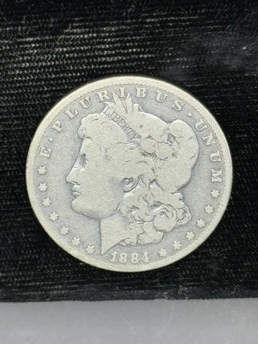 1884-CC Morgan Dollar - Good (#61261-L)