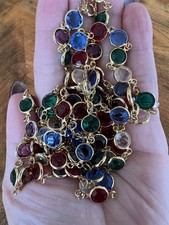 two beautiful Swarovski crystal necklaces in various colors with settings