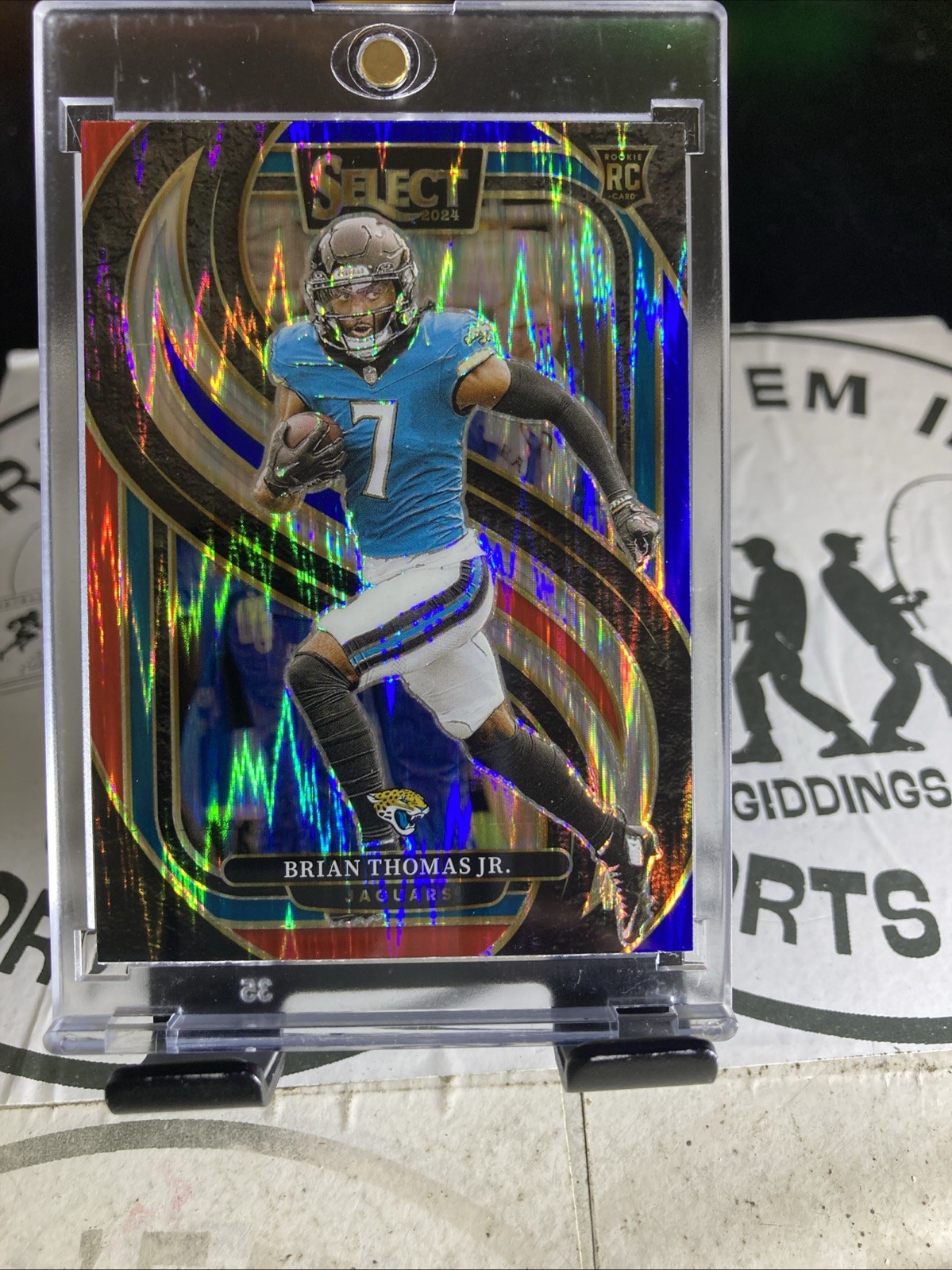 2024 SELECT ROOKIE PRIZM PREMIER RED/BLUE SHOCK ROOKIE BRIAN THOMAS JR!#143.
