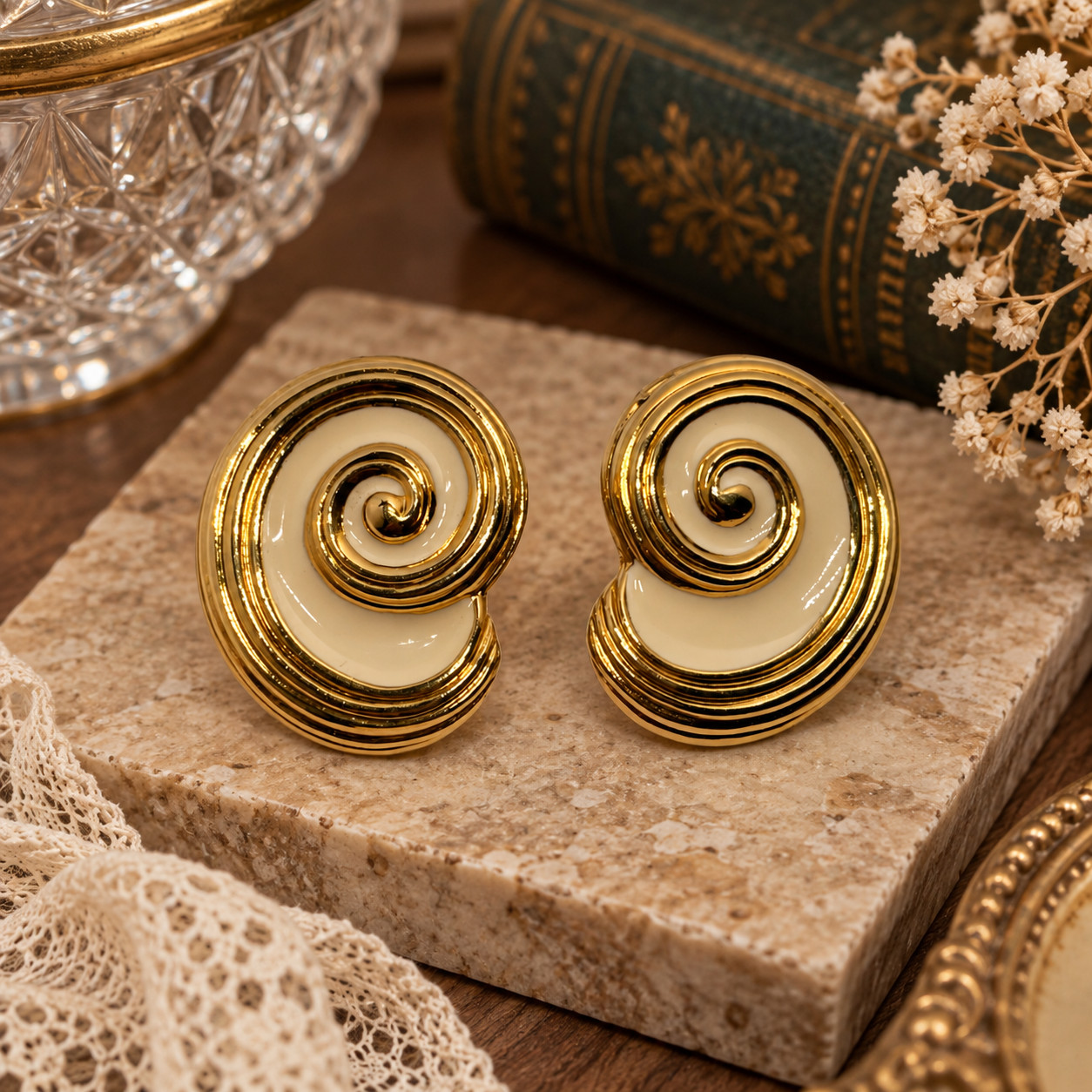 Cream enamel gold tone spiral nautilus swirl statement earrings