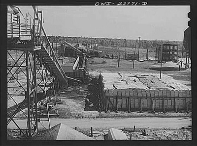 Photo:Lufkin Texas 1930s Southland Paper Mill Kraft Pulp Stockpile