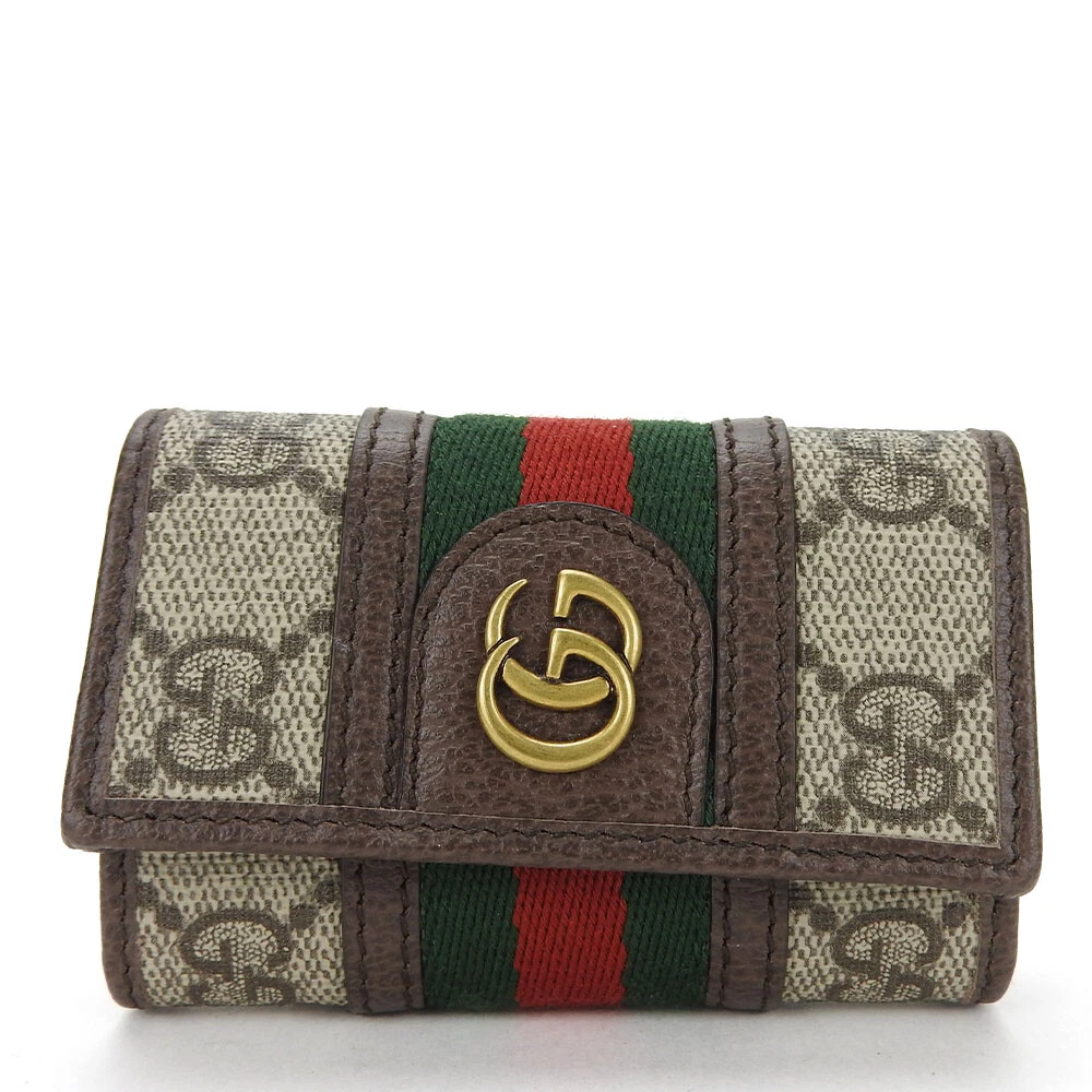Porte clés GUCCI D'OCCASION off cerf 603732 Sherry GG Supreme toile/cuir beige...