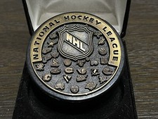 BRONZE NHL SHIELD Raised Logos Hockey Puck Whalers Canadiens Hurricanes Canucks
