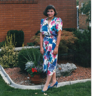 Attractive Young Woman Floral Dress Blue High Heels Outdoors Vintage Color Photo