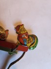 Vintage Tin Litho Metal Roosters Pecking Hand Squeeze Toy — photo 3