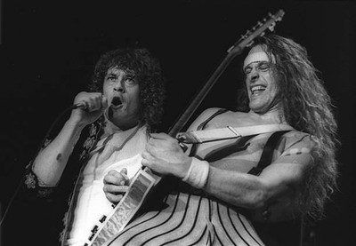 Brian Howe singer Ted Nugent guitarist during a concert of their b- Old Photo 1