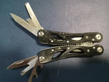 9 Multi-tool Black, no brand name with knife, plies, file, etc