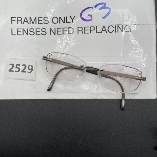 Silhouette Eyeglasses 7779 40 6052 Titan Light Brown Rimless Austria 52[]17 140