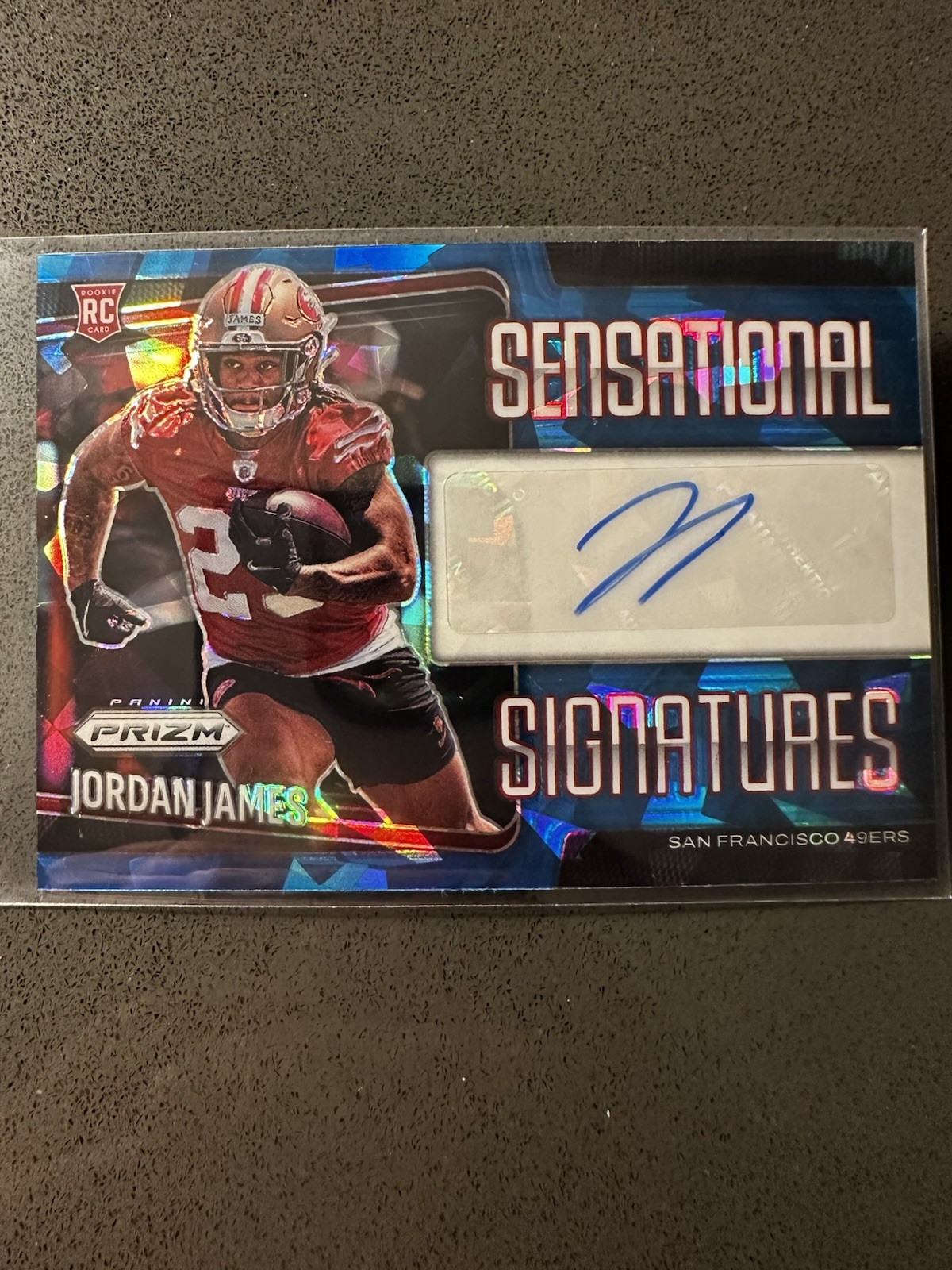 2025 Panini Prizm Jordan James Sensational Signatures /99 Blue Ice RC SP