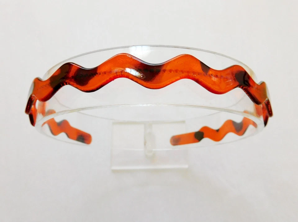 Juego de dos diademas onduladas de plástico sólido diseño negro y tortuga Foto 3 de 4