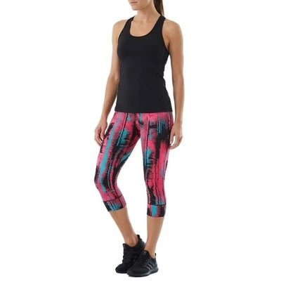 Fabletics Capri-style Leggings with a Black, Hot Pink, and Teal Abstract Print - Image 1 of 4