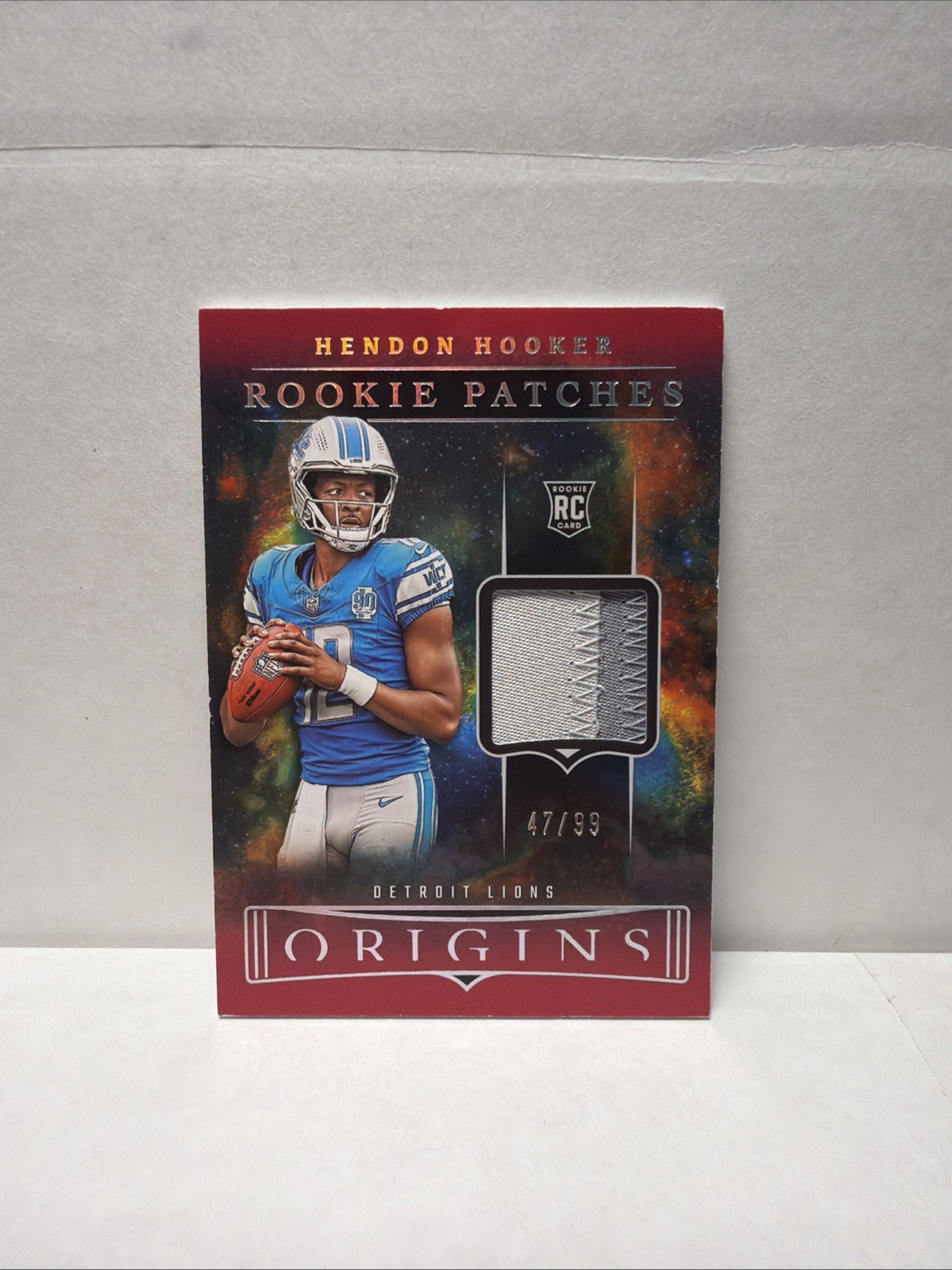 2023 Panini Origins - Rookie Patches Hendon Hooker #RP-HH Red /99 (MEM, RC)