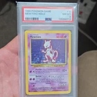 Pokémon TCG 1999 Base Set Mewtwo Holo Rare 10/102 PSA 8 The Pokémon Company