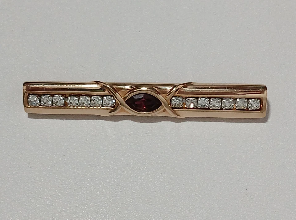 Broche prendedor barra cristal transparente y púrpura SAL firmado por Swarovski vintage tono dorado  Foto 2 de 4