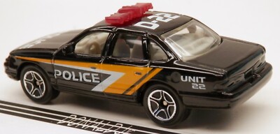 Matchbox 1992-1997 Ford Crown Vic Blue Police Car Black w/Orange D