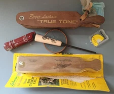 LOT OF TURKEY CALLS AND COMPASS
