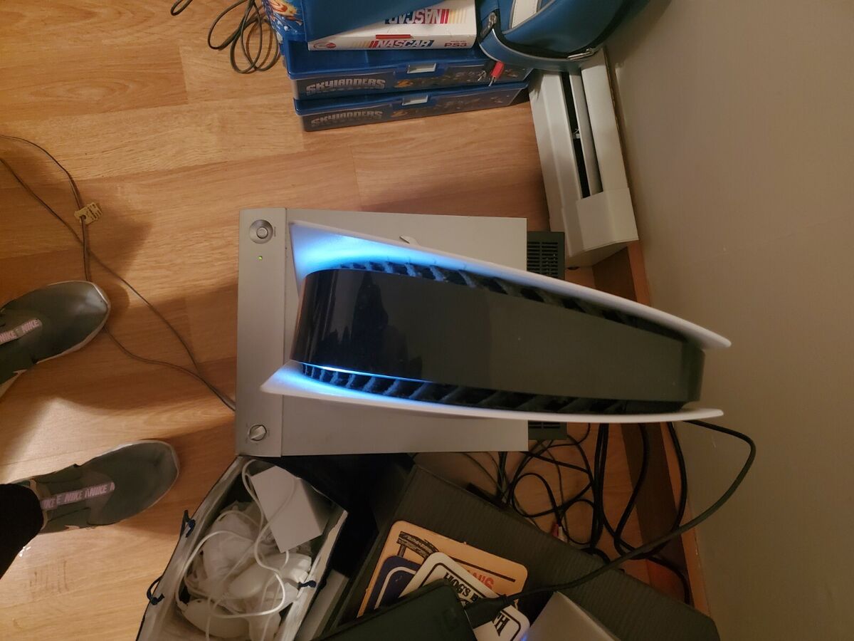 ps5 console disc version with controllers, a game and headset. Used.