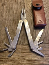 MULTI-TOOL KIT BY AMERICAN CAMPER WITH BELT SHEATH IN GOOD WORKING CONDITION