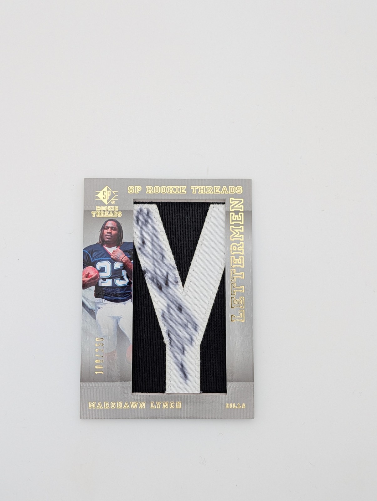 Marshawn Lynch SP Rookie Threads #134 Letterman-Silver Name