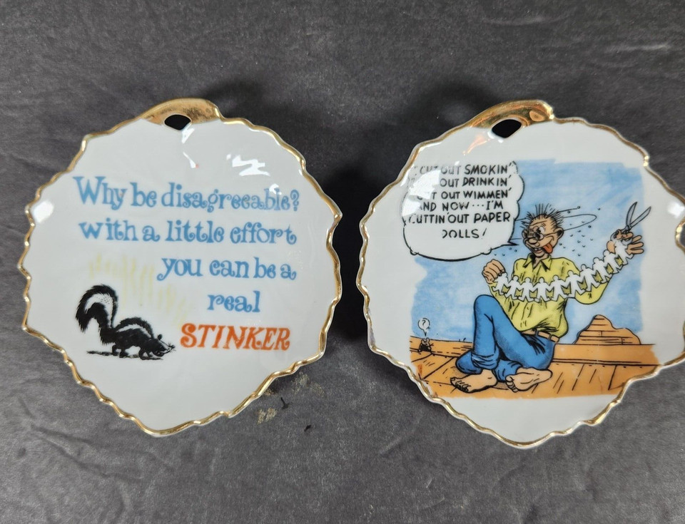 Pair of cheeky vintage 'Made in Japan' California Creations trinket dishes with deadpan humor — the kind of kitschy desk art you can't stop smiling at.