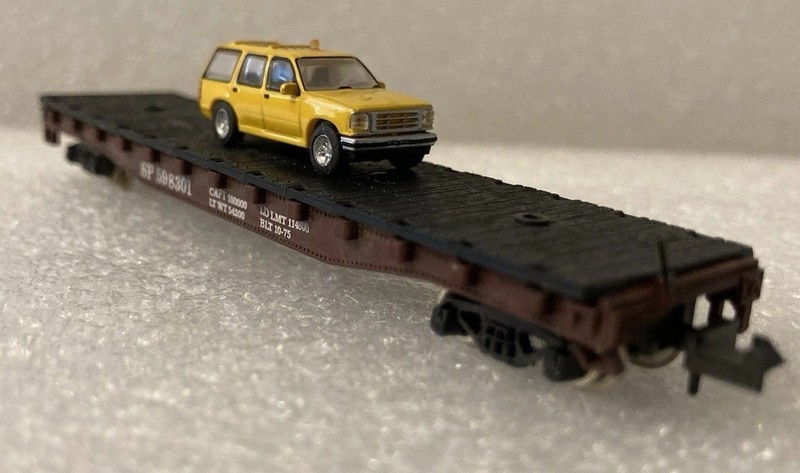 Atlas N Southern Pacific Flatbed w/Black Wood Deck W/yellow SUV 1379FF6584-2B26