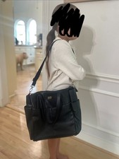 Black Fresh Picked Diaper Bag With Extended Strap Has A Small Blemish