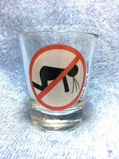  Clear Shot Glass w/ Man on the Floor Throwing Up w/ Red Line Thru Circle -Kalan