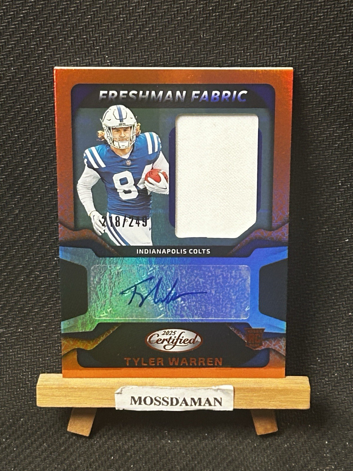 2025 Panini Certified Freshman Fabric Tyler Warren Orange Rookie Patch Auto /249