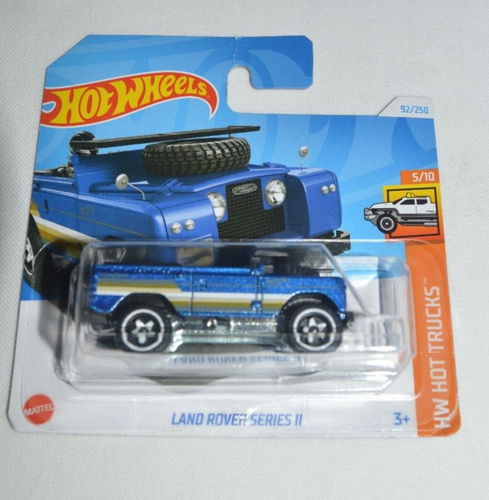HOT WHEELS 2024 HW HOT TRUCKS 5/10 - LAND ROVER SERIES II BLUE ON A SHORT CARD - Picture 2 of 6