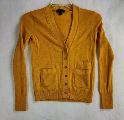 yellow button up sweater