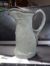 CERES green stoneware relief moulded jug  by EDWARD WALLEY