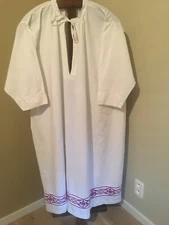 Alb whit a beautiful purple ribon