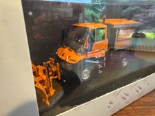 Snowplow Mercedes Benz Unimog 300 w/snow plow and salt spreader 1:43
