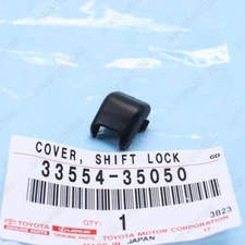 Genuine OEM  Toyota  TACOMA Shift Lock Plate Cover, Hole Plastic Cap 33554-35050
