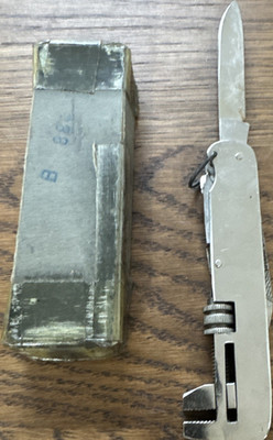 This is a vintage all-steel Japanese multitool,  dating from the 1950s
